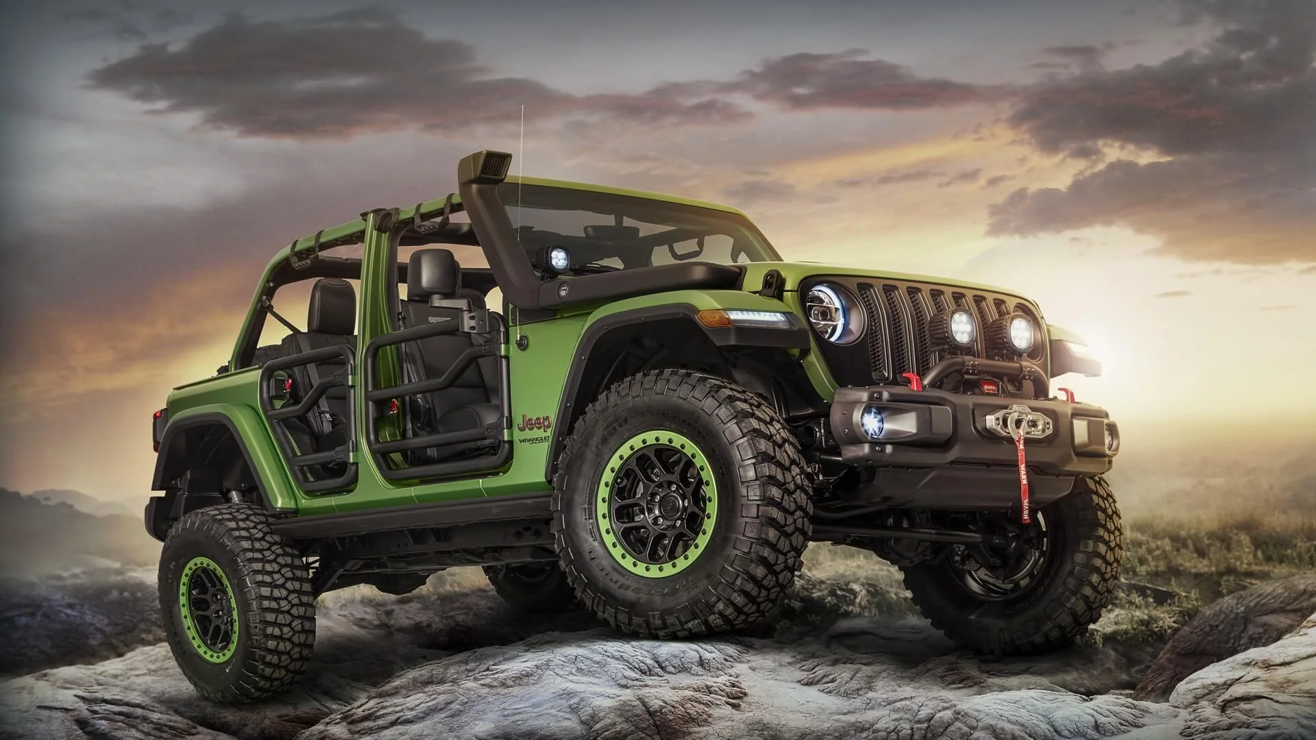 green car on top of mountain